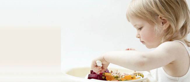 Closeup toddler eating 